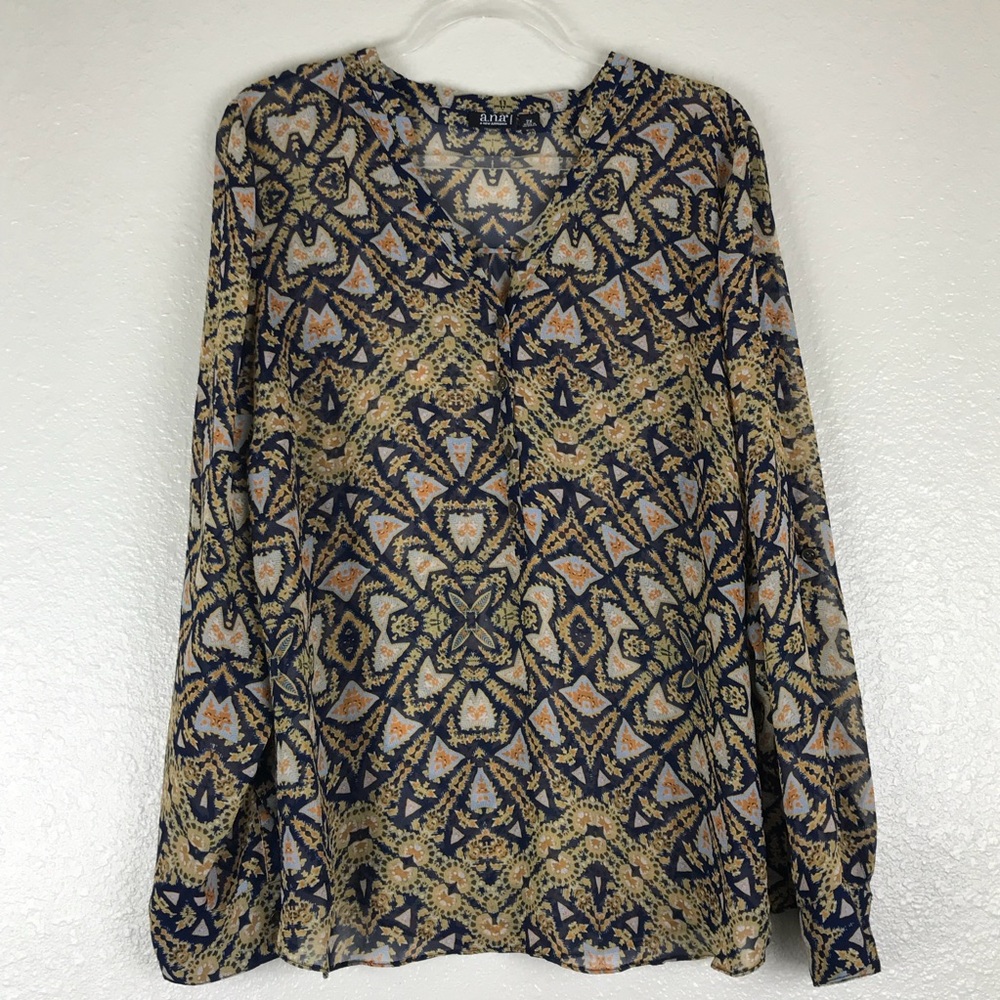 Sheer long sleeve top.